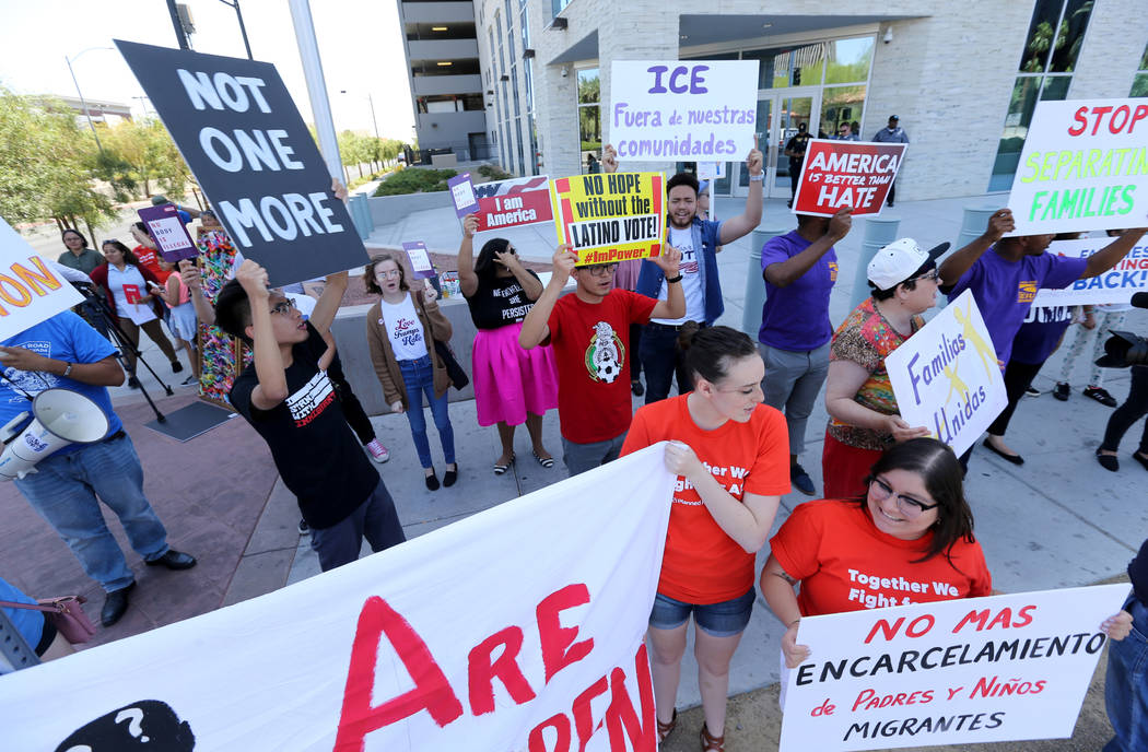 Protesters chant during a National Day of Action protest outside the Federal Justice Tower where U.S. Immigration and Customs Enforcement has offices Friday, June 1, 2018. K.M. Cannon Las Vegas Re ...