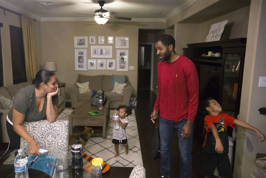 Licensed mental health therapist Sheldon Jacobs, second from right, spends time wife Nicole, daughter Arianna and son Jayden on Friday, Aug. 31, 2018, at Jacobs home, in Las Vegas. Benjamin Hager ...