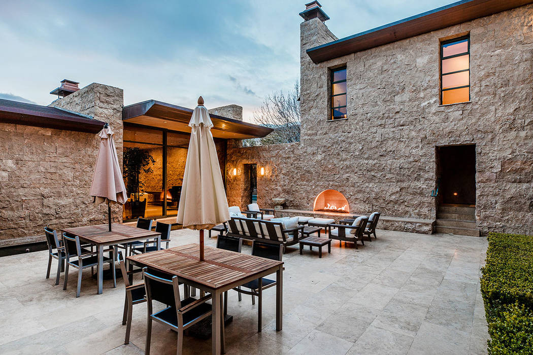The courtyard has a fireplace. (Ivan Sher Group)