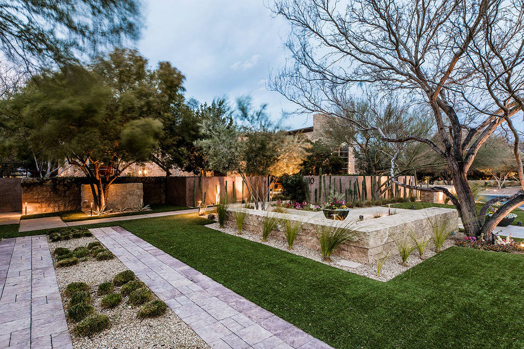 The Ridges home has a mix of lush and desert landscaping. (Ivan Sher Group)
