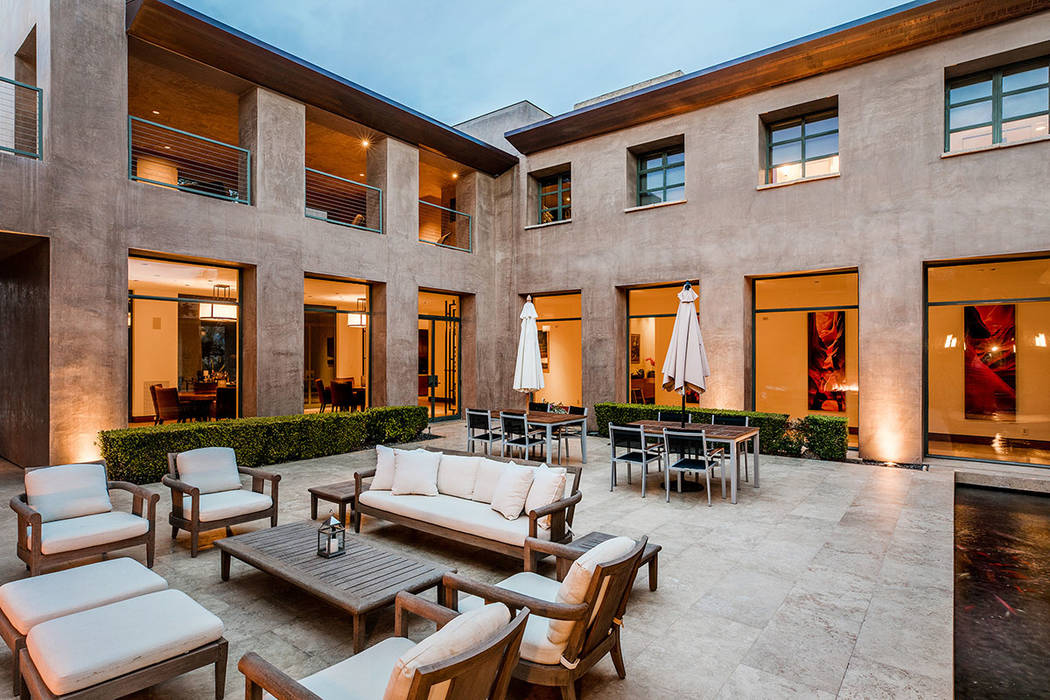 The central courtyard connects the different areas of the home. (Ivan Sher Group)