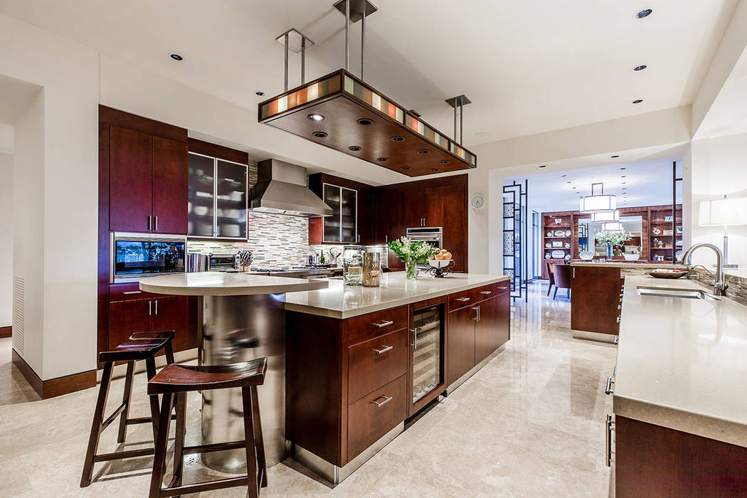 The spacious chef’s kitchen provides a well-designed space attired in professional grade appliances, SieMatic custom cabinetry and granite counters. (Ivan Sher Group)