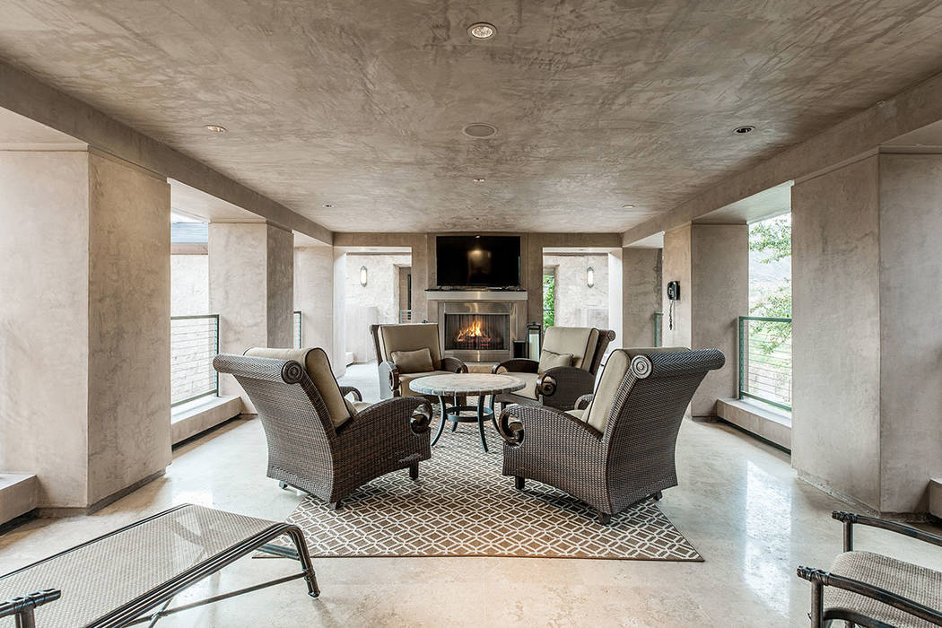 The master suite has an outdoor balcony with a fire feature. (Ivan Sher Group)