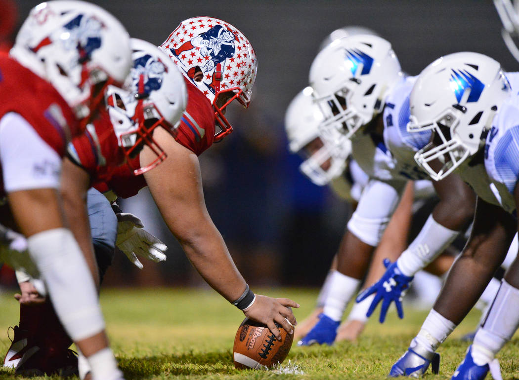 Liberty center Jeremiah Taiese (75) gets ready to snap the ball during a game against IMG Academy at Liberty High School in Henderson on Friday, Sept. 7, 2018. IMG Academy won 35-0. Brett Le Blanc ...