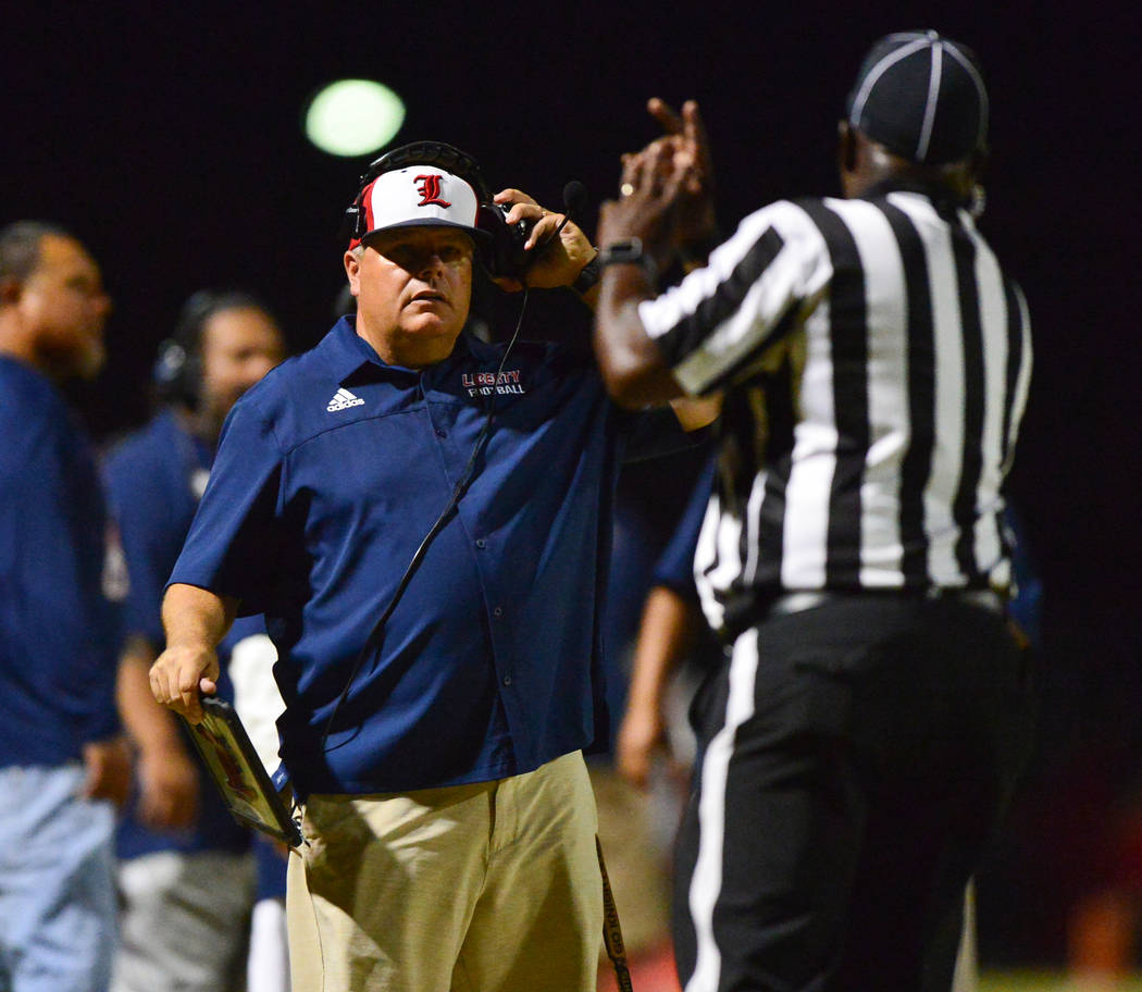 Liberty head coach Rich Muraco talks to a referee at Liberty High School in Henderson on Friday, Sept. 7, 2018. IMG Academy won 35-0. Brett Le Blanc Las Vegas Review-Journal