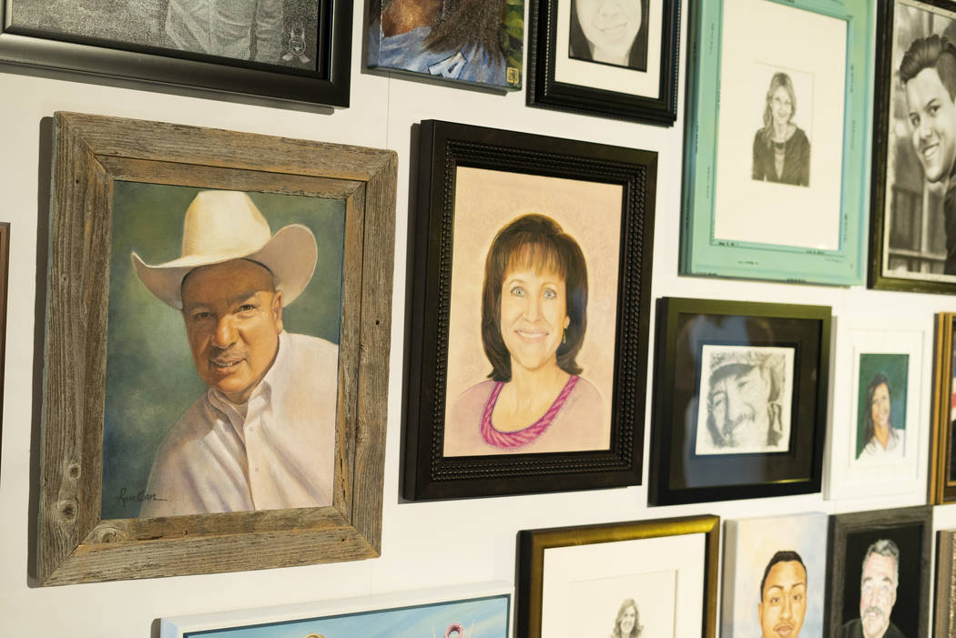 Portraits of victims from the October 1 shooting on display as part of the Las Vegas Portraits Project at the Clark County Government Center in Las Vegas, Monday, Sept. 17, 2018. The exhibit is pa ...