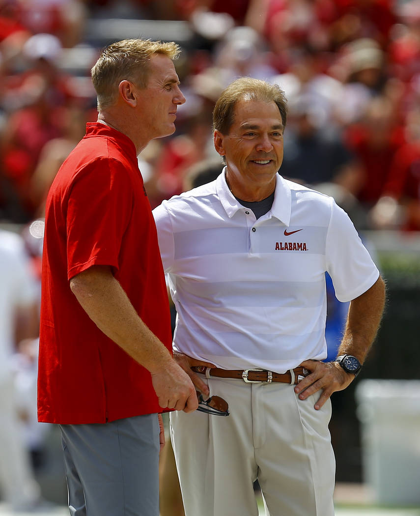Arkansas State head coach Blake Anderson, left, talks with Alabama head coach Nick Saban before the start of an NCAA college football game, Saturday, Sept. 8, 2018, in Tuscaloosa, Ala. (AP Photo/B … | Arkansas State head coach Blake Anderson, left, talks with Alabama head coach Nick Saban before the start of an NCAA college football game, Saturday, Sept. 8, 2018, in Tuscaloosa, Ala. (AP Photo/B … |