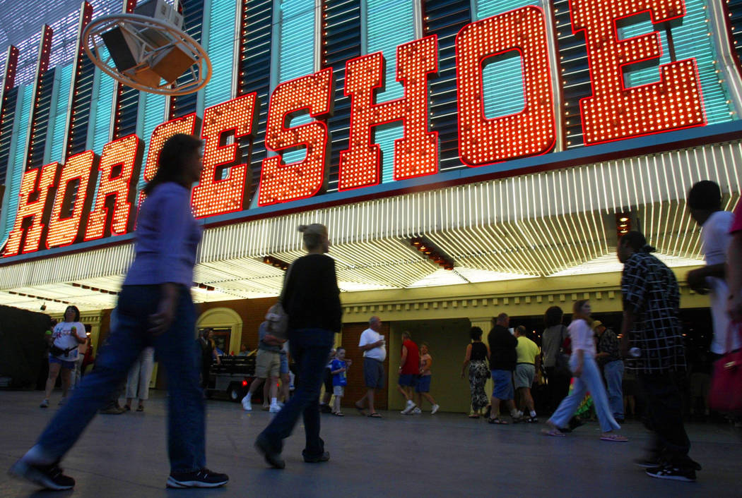 People walk into Binion's Horseshoe in downtown Las Vegas in 2004. (File Photo)
