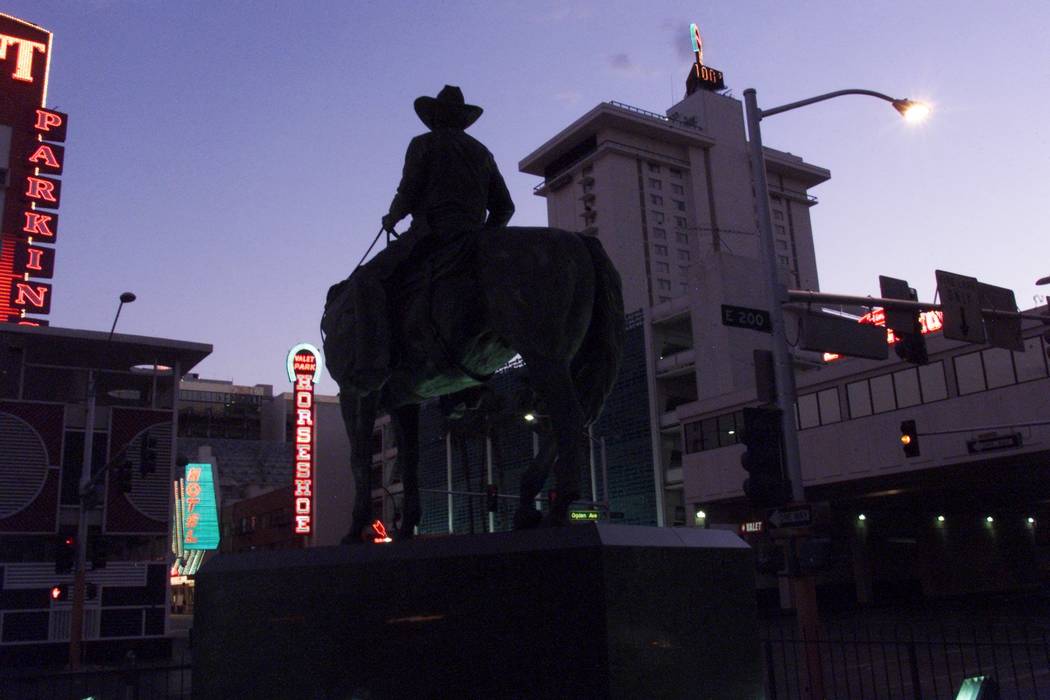 A statue of the late Benny Binion, founder of Binion's Horseshoe, looks over the downtown casino Tuesday, Aug. 14, 2001, on the 50th anniversary of the Fremont Street landmark. K.M. Cannon/Las Veg ...