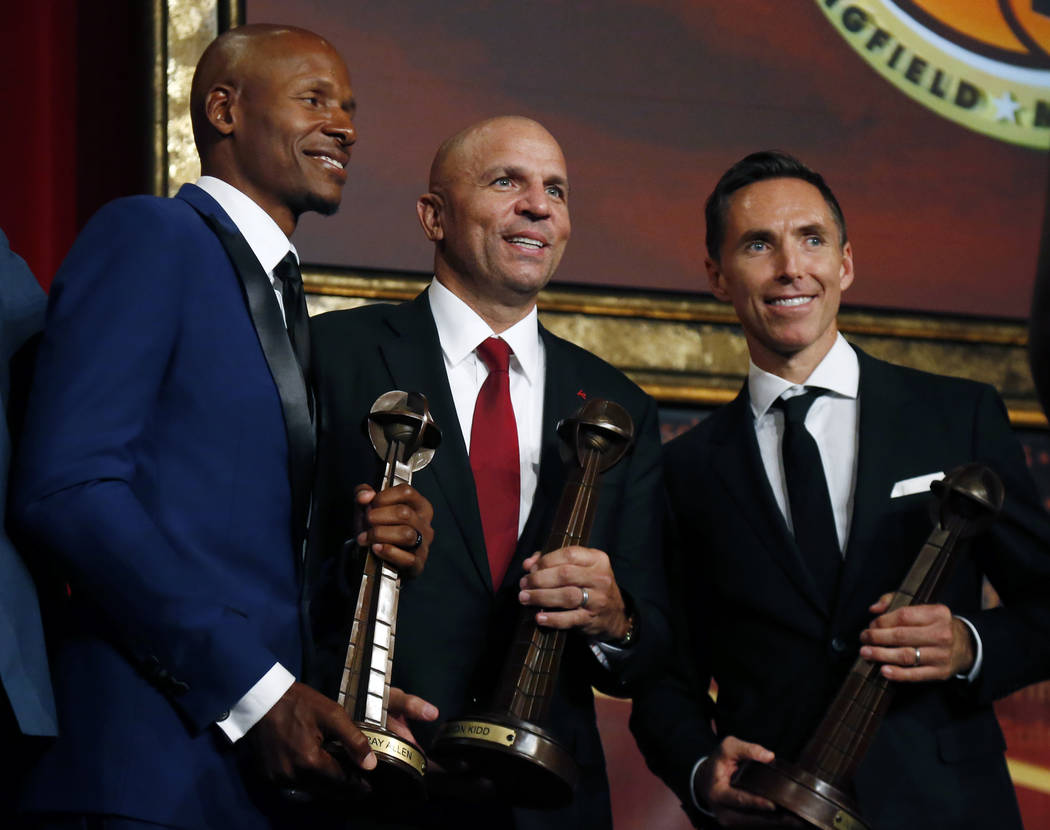 Ray Allen, Jason Kidd and Steve Nash, from left, pose for a photo after induction ceremonies at the Basketball Hall of Fame, Friday, Sept. 7, 2018, in Springfield, Mass. (AP Photo/Elise Amendola)