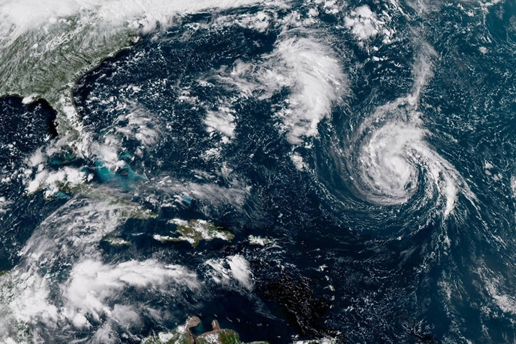 This satellite image shows Tropical Storm Florence in the Atlantic Ocean on Saturday, Sept. 8, 2018. (NOAA via AP)