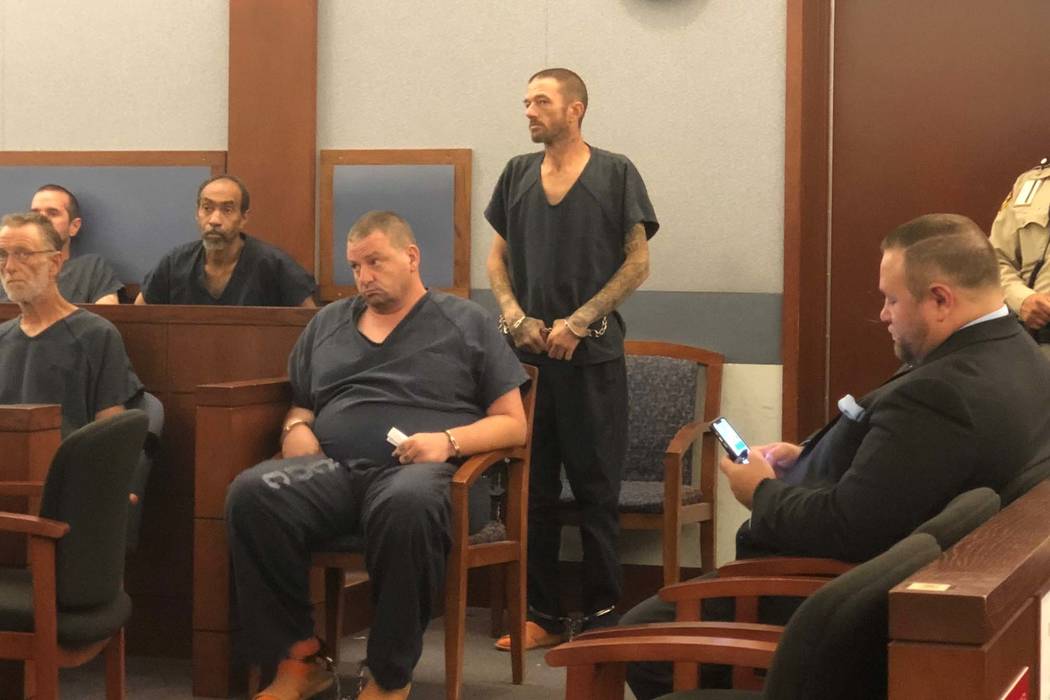Joshua Oxford, standing, appears in Las Vegas Justice Court on Monday, Sept. 10, 2018. He faces a murder charge in the death of 3-year-old Daniel Theriot. (David Ferrara/Las Vegas Review-Journal)