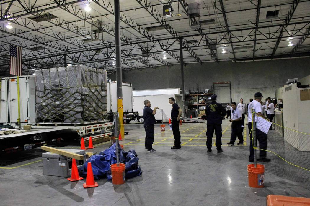 Members of Nevada Task Force One make their final preparations on Sept. 11, 2018, before deploying to Virginia, where the team will support local agencies responding to Hurricane Florence. (Max Mi ...