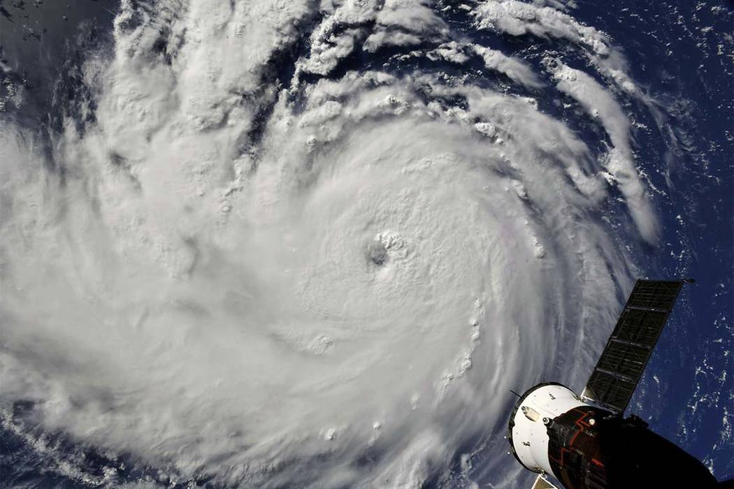 This photo provided by NASA shows Hurricane Florence from the International Space Station on Monday, Sept. 10, 2018, as it threatens the U.S. East Coast. (NASA via AP)