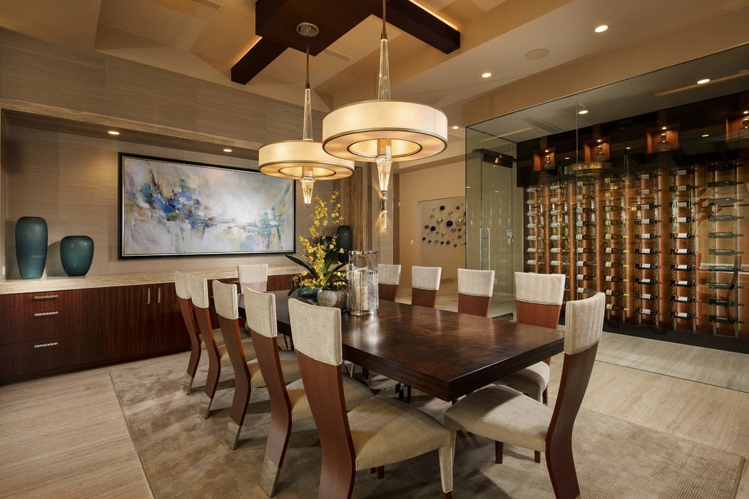 The formal dining room has a wine wall. (Shay Velich)