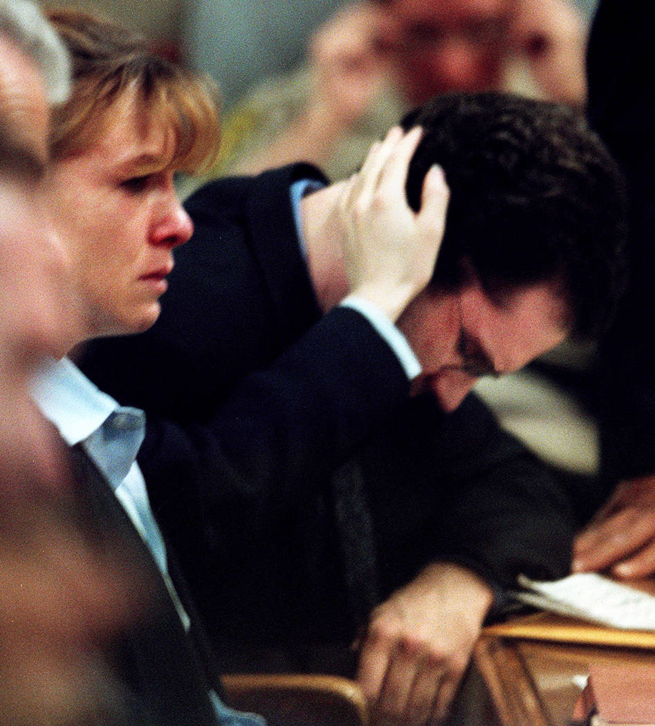 Sandy Murphy touches Rick Tabish while Tabish's mother, Lani, testifies in February 2001 during the penalty phase of the Ted Binion murder trial. (File Photo)