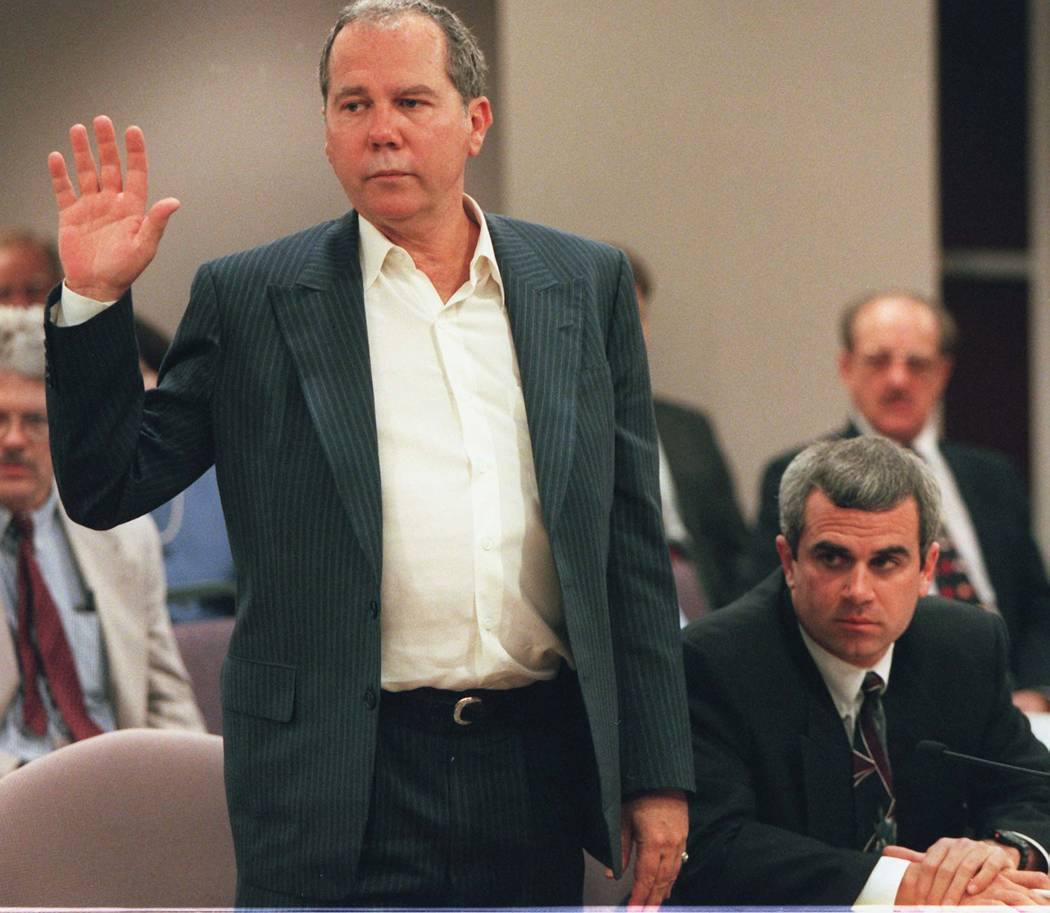 Ted Binion prepares to testify in April 1996 while attorney Mark Ferrario sits beside him during a Gaming Control Board hearing. (File Photo)
