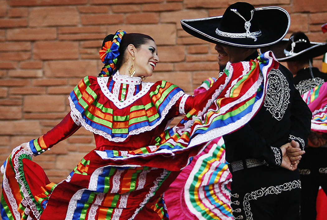 Melissa Manriquez, left, dances a traditional Mexican dance with her partner Ulises Espitia at the Clark County Government Center Amphitheater in Las Vegas in 2011. (Las Vegas Review-Journal)