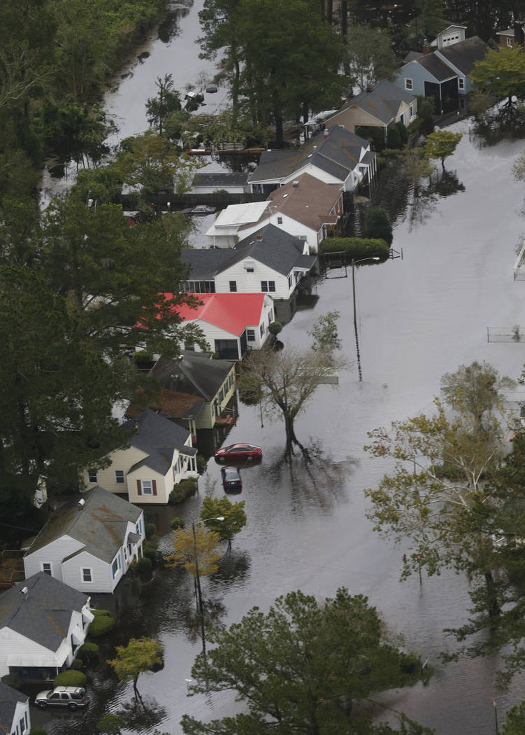 Flooded homes along the Neuse river in New Bern, NC., Saturday, Sept. 15, 2018. (AP Photo/Steve Helber)