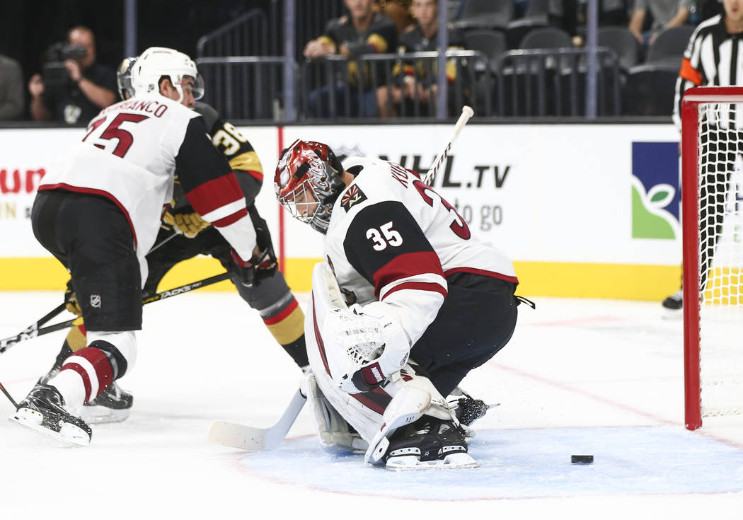 Golden Knights left wing Max Pacioretty, not pictured, sends the puck past Arizona Coyotes goaltender Darcy Kuemper (35) to score during the first period of a preseason NHL hockey game at T-Mobile ...