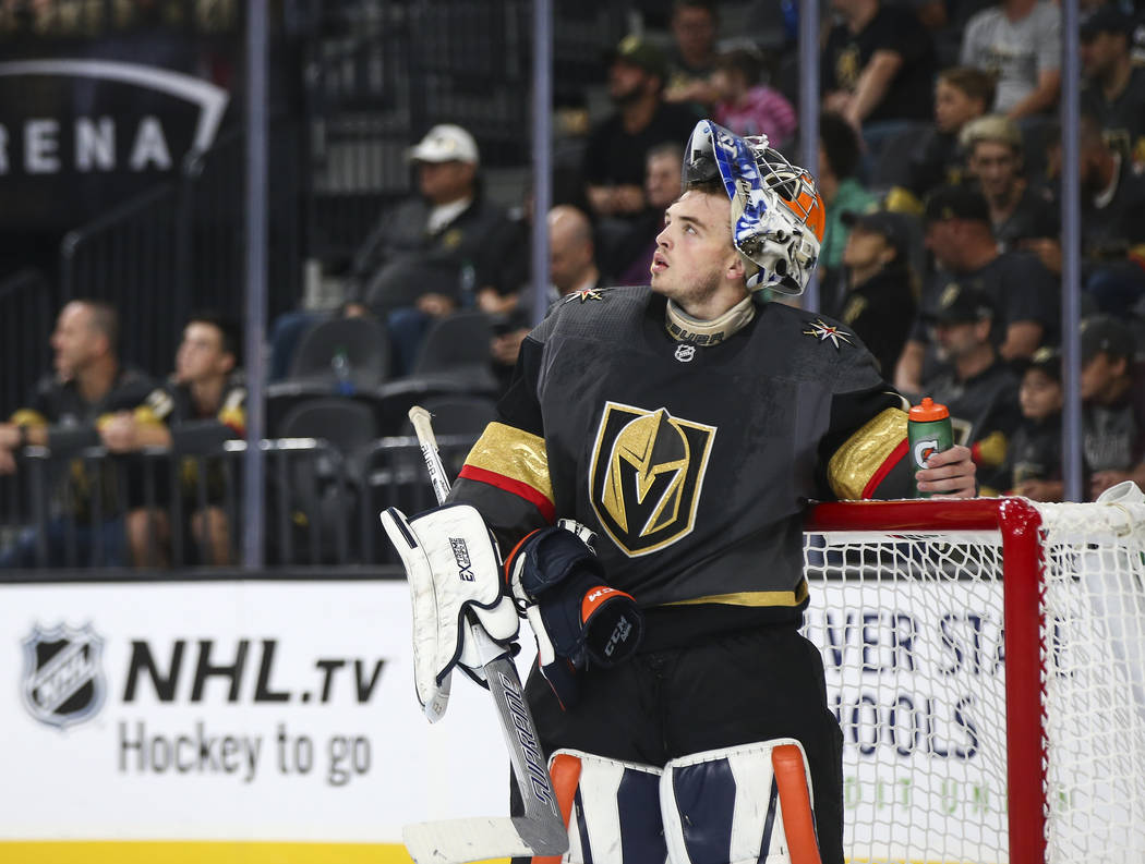 Golden Knights goaltender Dylan Ferguson (1) looks on during the second period of a preseason NHL hockey game against the Arizona Coyotes at T-Mobile Arena in Las Vegas on Sunday, Sept. 16, 2018. ...