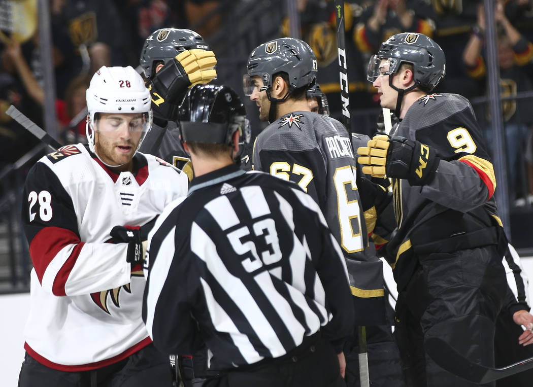Golden Knights left wing Max Pacioretty (67) celebrates his first goal as a Golden Knight with teammates during the first period of a preseason NHL hockey game against the Arizona Coyotes at T-Mob ...