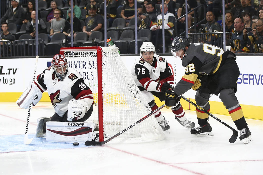 Golden Knights left wing Tomas Nosek (92) sends the puck around to assist on a goal by Golden Knights center Jonathan Marchessault, not pictured, during the first period of a preseason NHL hockey ...