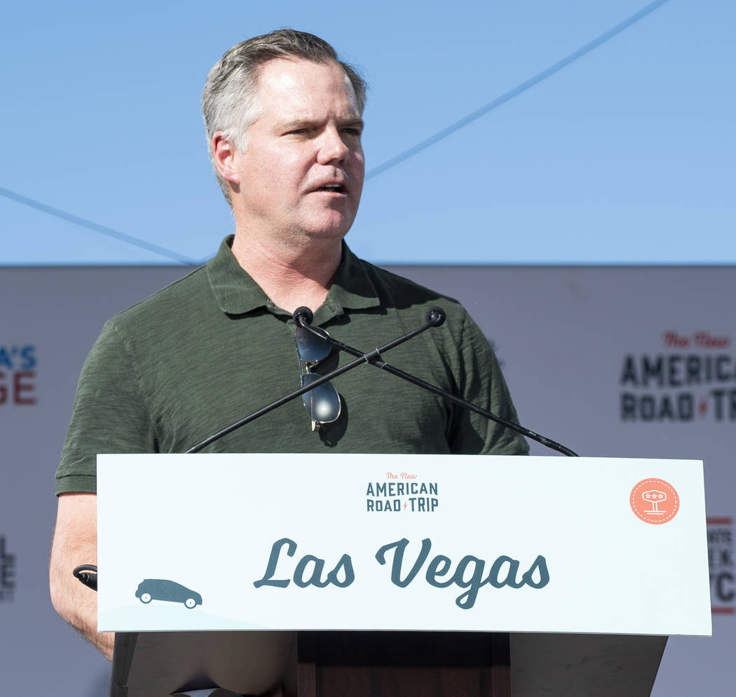 MGM Resorts International CEO James Murren speaks in front of the Luxor casino-hotel in Las Vegas at an event for "The New American Road Trip," an electric-vehicle tour from California t ...