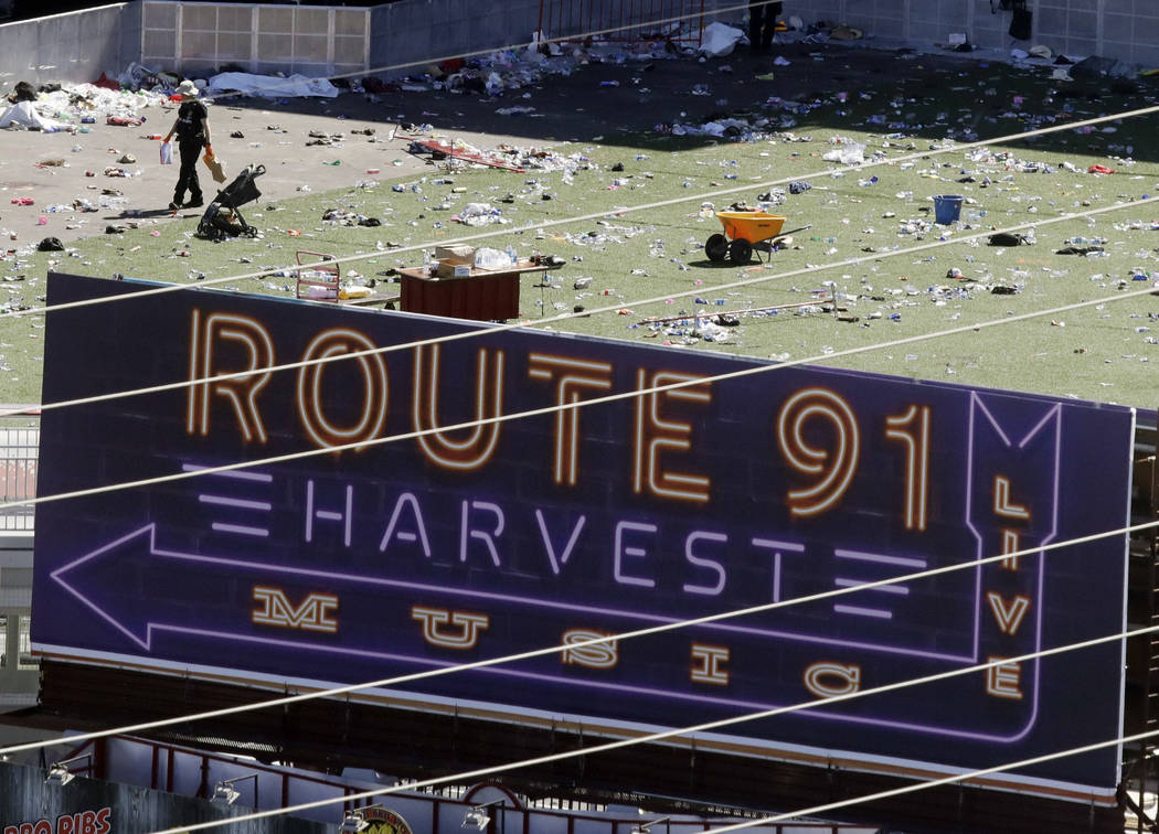 Investigators work the scene after the mass shooting at the Route 91 Harvest music festival on the Las Vegas Strip on Oct. 1, 2017. (Chris Carlson/AP, File)
