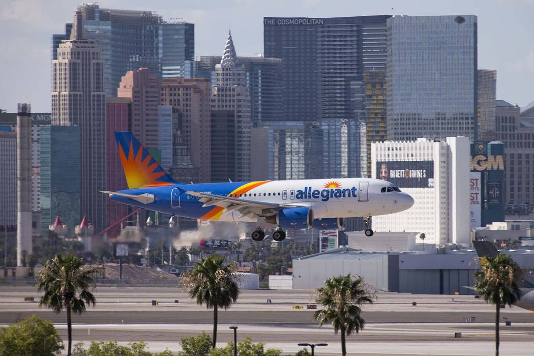 An Allegiant Air flight lands at McCarran International Airport in Las Vegas. (Richard Brian/Las Vegas Review-Journal) @vegasphotograph
