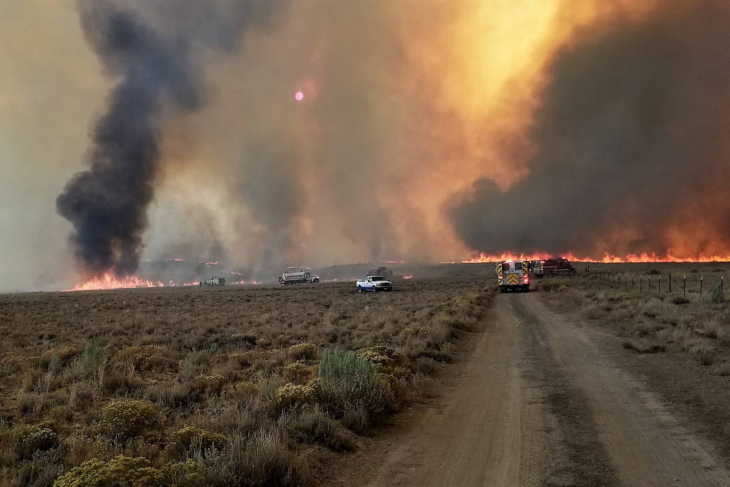 Fire crews battle the South Sugarloaf Fire in Elko County. The fire burned through Nevada's newest conservation easement on the Wildhorse Ranch before it was brought under control. (Rocky Mountain ...