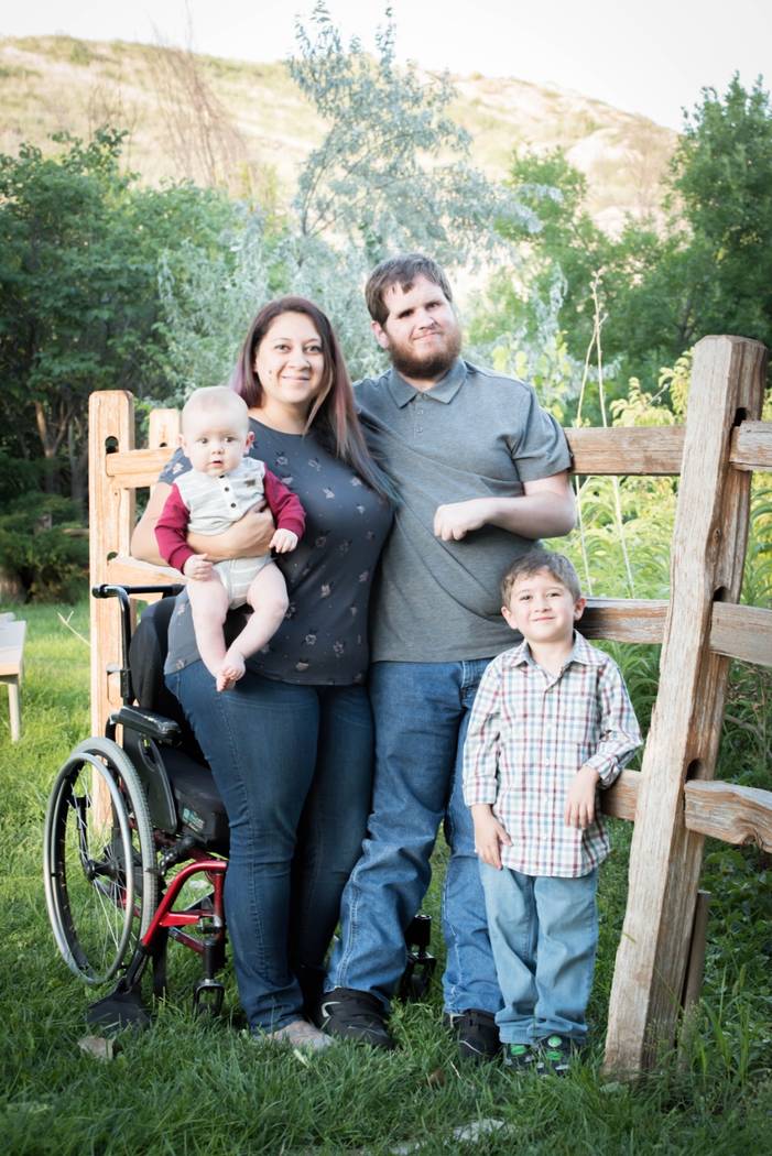 Katie Medley, 28, and Caleb Medley, 29, with their sons. Caleb was one of the victims in the 2012 Aurora shooting in Colorado. (Bliss Photography)