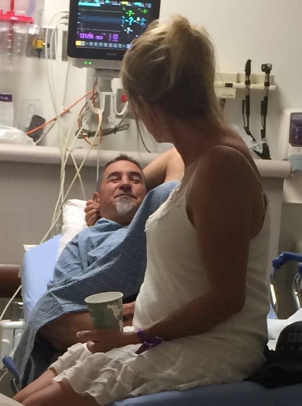 Tami LeBrun, 53, gazes lovingly at her husband, Brian LeBrun, 54, shortly after he was shot in the right arm at the Oct. 1, 2017 mass shooting on the Las Vegas Strip.