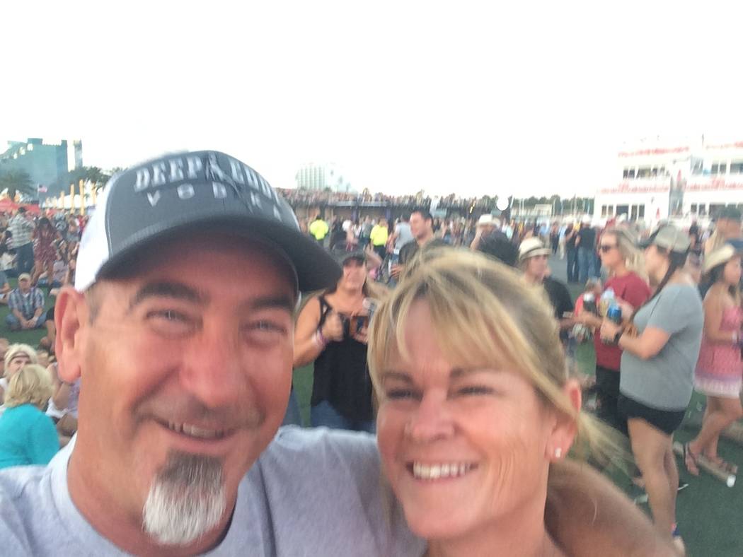 Tami LeBrun, 53, with her husband, Brian LeBrun, 54, shortly at the Route 91 Harvest festival before the Oct. 1, 2017 shooting. (Courtesy of Tami LeBrun)