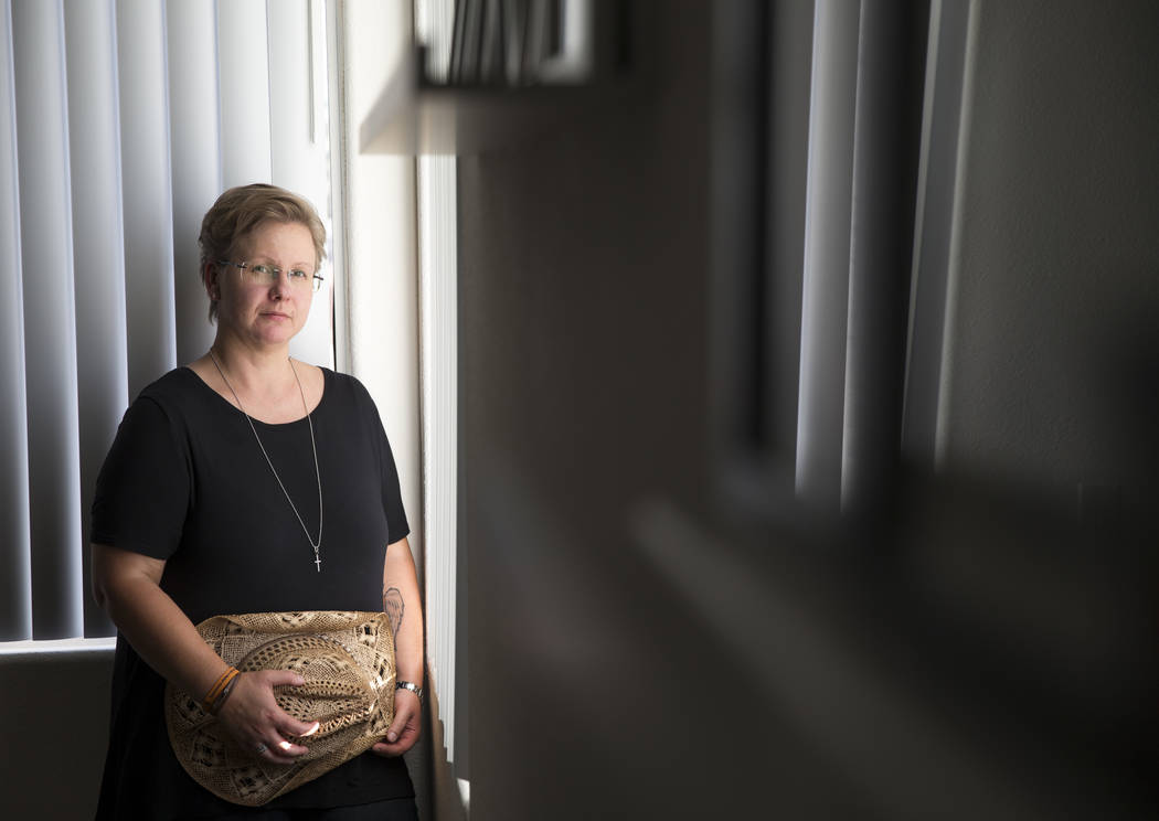 Las Vegas resident and Route 91 survivor Nadine Lusmoeller, 40, poses at her west valley home in Las Vegas on Friday, Sept. 22, 2018. Nadine was shot in the leg and broke her arm during the festiv ...
