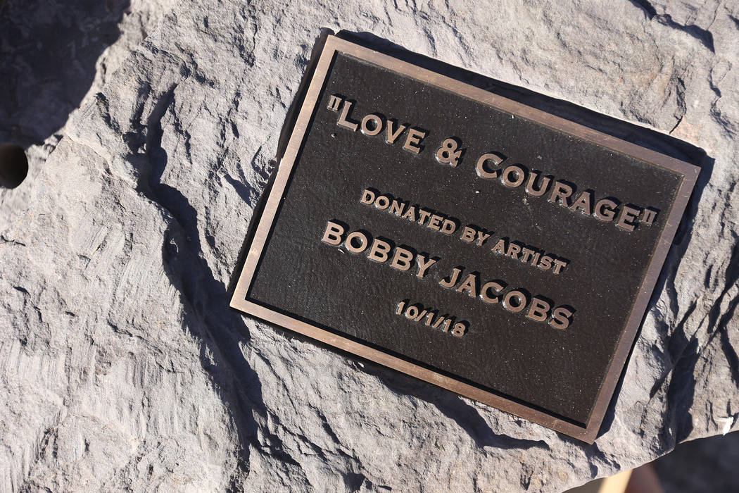 The base of the stone sculpture designed by artist Bobby Jacobs that will be placed in the Healing Garden in Las Vegas, Thursday, Sept. 20, 2018. The back of the wings have the initials of each of ...
