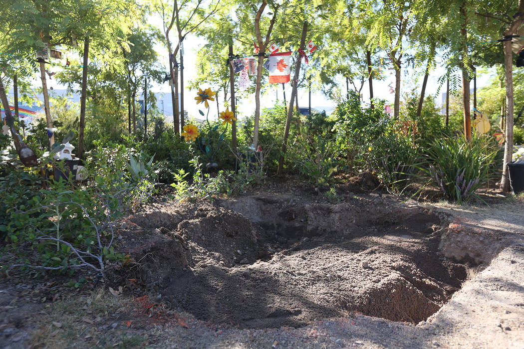 The hole for the stone sculpture designed by artist Bobby Jacobs in the Healing Garden in Las Vegas, Thursday, Sept. 20, 2018. The back of the wings have the initials of each of the Oct. 1 victims ...