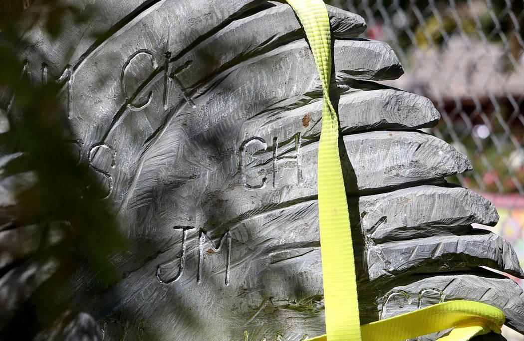 The new stone sculpture of angel wings created by Bobby Jacobs is partially installed at the Healing Garden in Las Vegas, Thursday, Sept. 20, 2018. The back of the wings of the sculpture have the ...