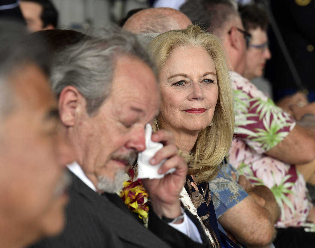 Diana Brown Sanfilippo right, who has spent a lifetime searching for her father, 1st Lt. Frank Salazar who died 66 years ago in North Korea, attends a ceremony marking the arrival of the remains b ...
