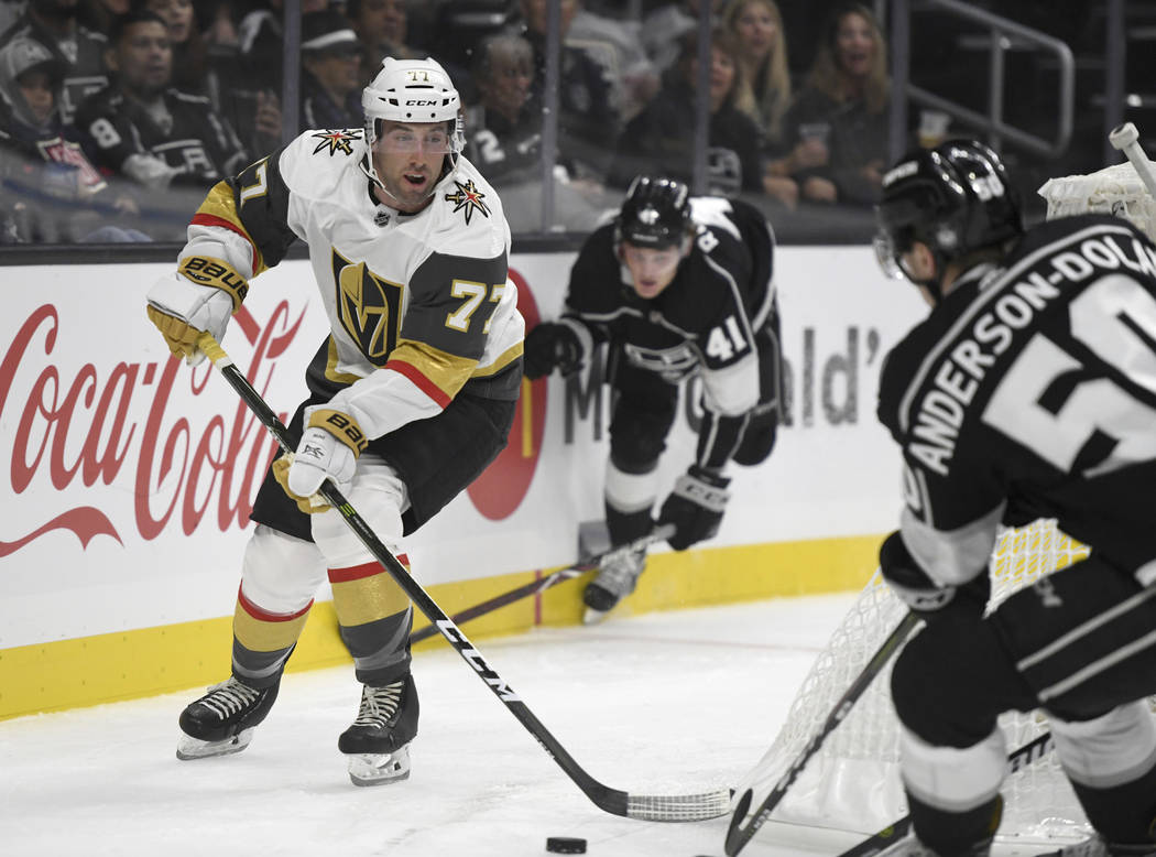 Vegas Golden Knights defenseman Brad Hunt (77) advances the puck against the Los Angeles Kings during the first period of a preseason NHL hockey game Thursday, Sept. 20, 2018, in Los Angeles. (AP ...