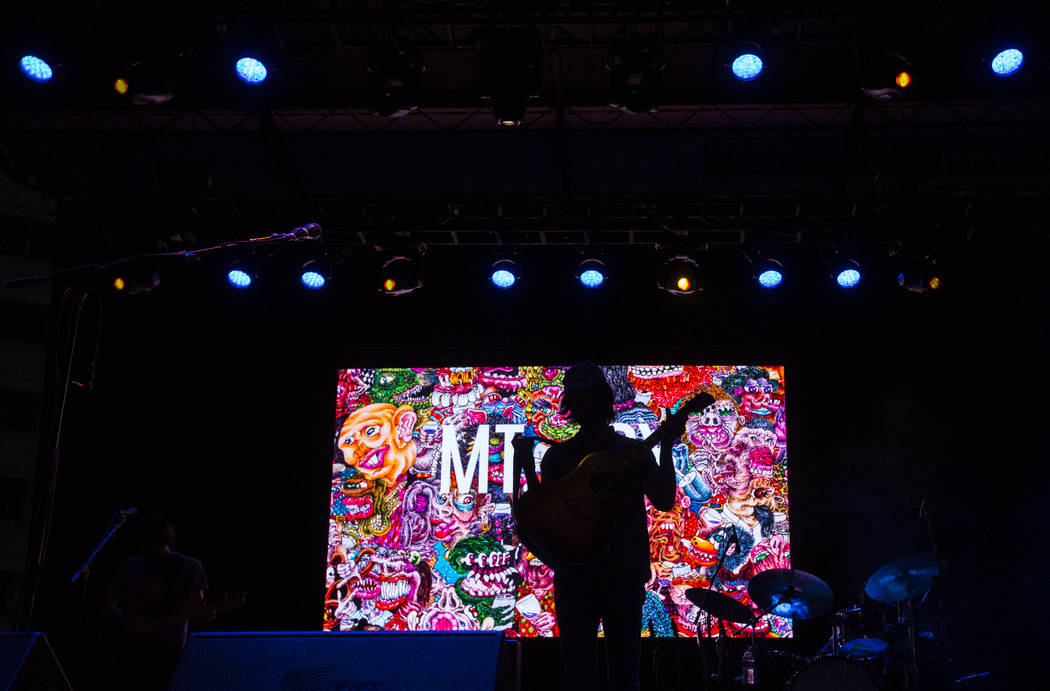 Matt Quinn of Mt. Joy is silhouetted while performing during the third day of the annual Life is Beautiful festival in downtown Las Vegas on Sunday, Sept. 23, 2018. Chase Stevens Las Vegas Review- ...