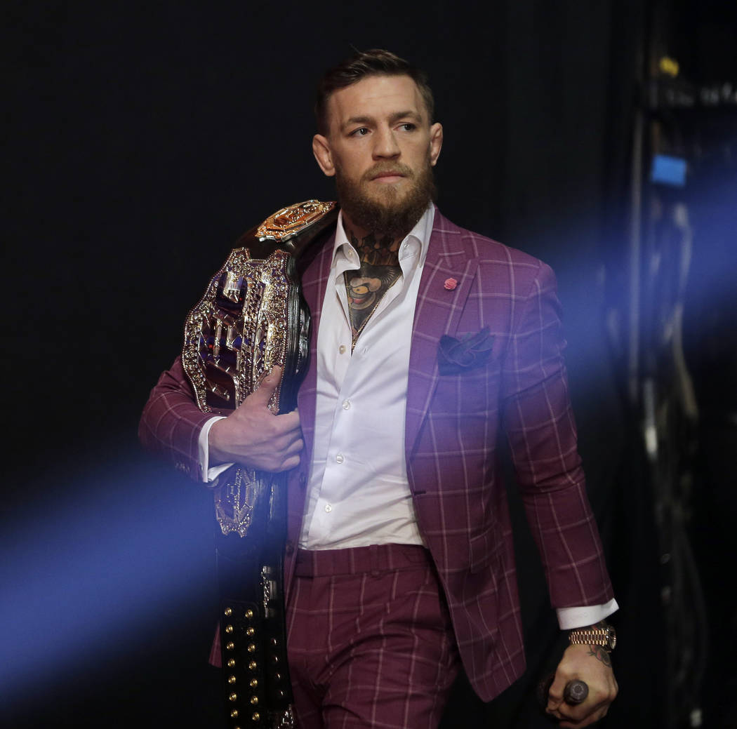 McGregor takes shots, then drinks them at UFC 229 press conference ...
