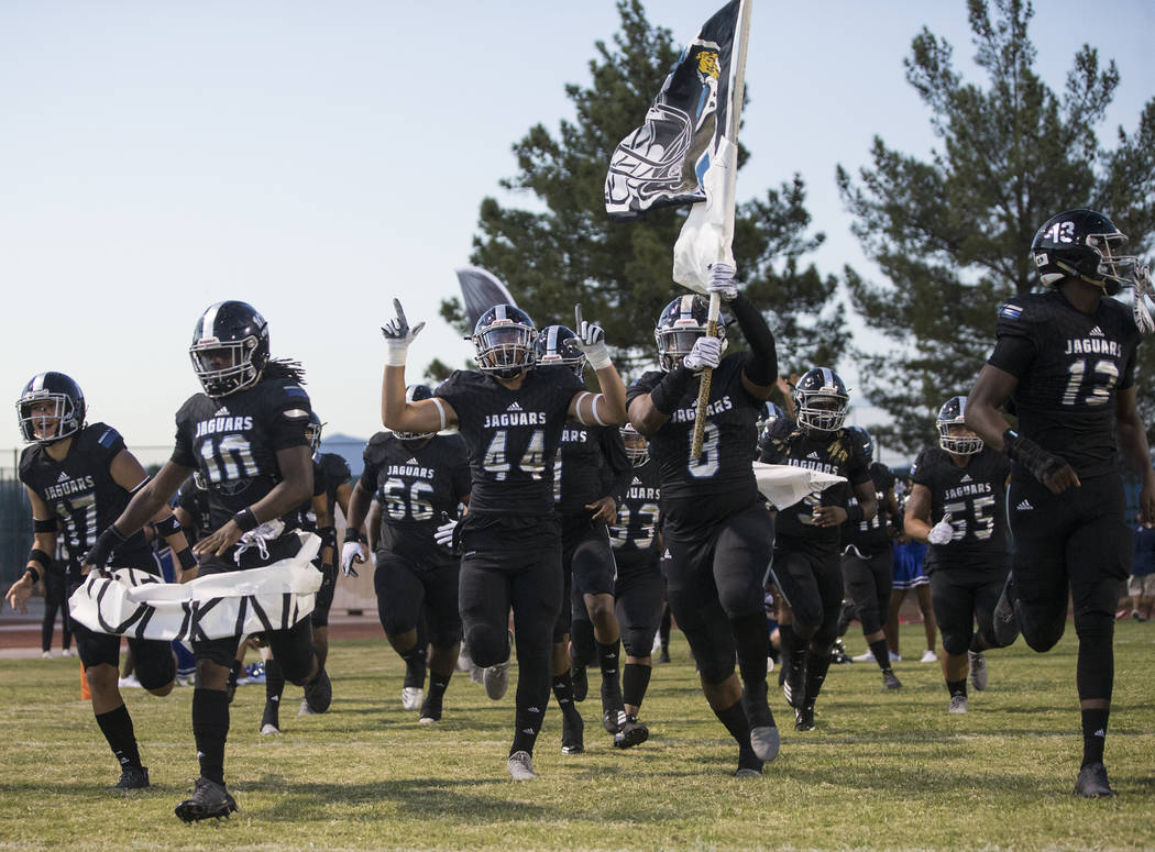 Desert Pines takes the field before the start of the Jaguars home game with the Liberty Patriots on Friday, Sept. 21, 2018, at Desert Pines High School, in Las Vegas. Benjamin Hager Las Vegas Revi ...