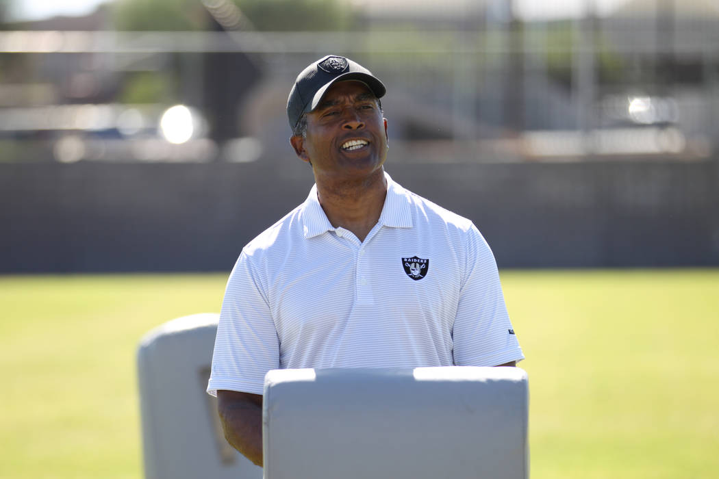 Raiders alumni Leo Gray participates in a youth football camp event at Robert Taylor Elementary School in Henderson, Tuesday, Sept. 25, 2018. The Raiders adopted the Communities In Schools of Sout ...