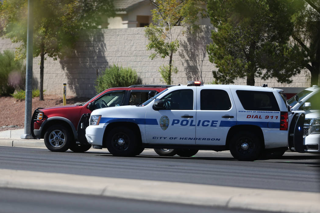 Henderson police investigate after an officer-involved shooting on Gibson Road near Trail Canyon Road, Saturday, Sept. 22, 2018. (Erik Verduzco/Las Vegas Review-Journal) @Erik_Verduzco