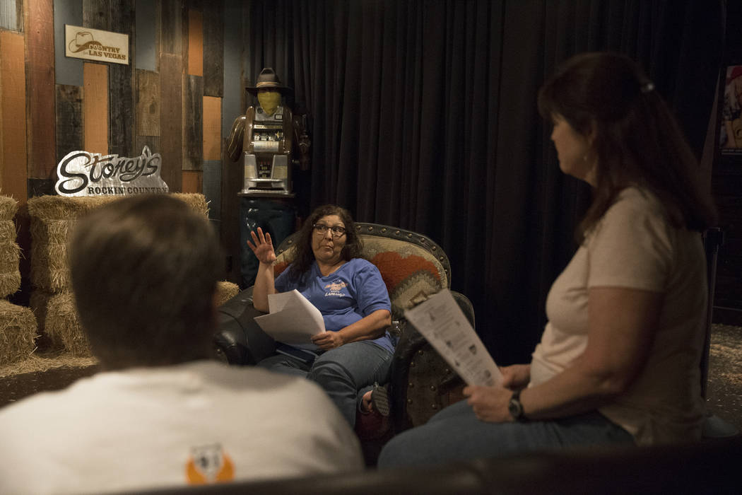 Yvette Archuleta, middle, talks about her lingering anxiety leading up to the anniversary of Oct 1 during a local Route 91 survivors support group on Wednesday, Sept. 26, 2018, at Stoney's Rockin' ...
