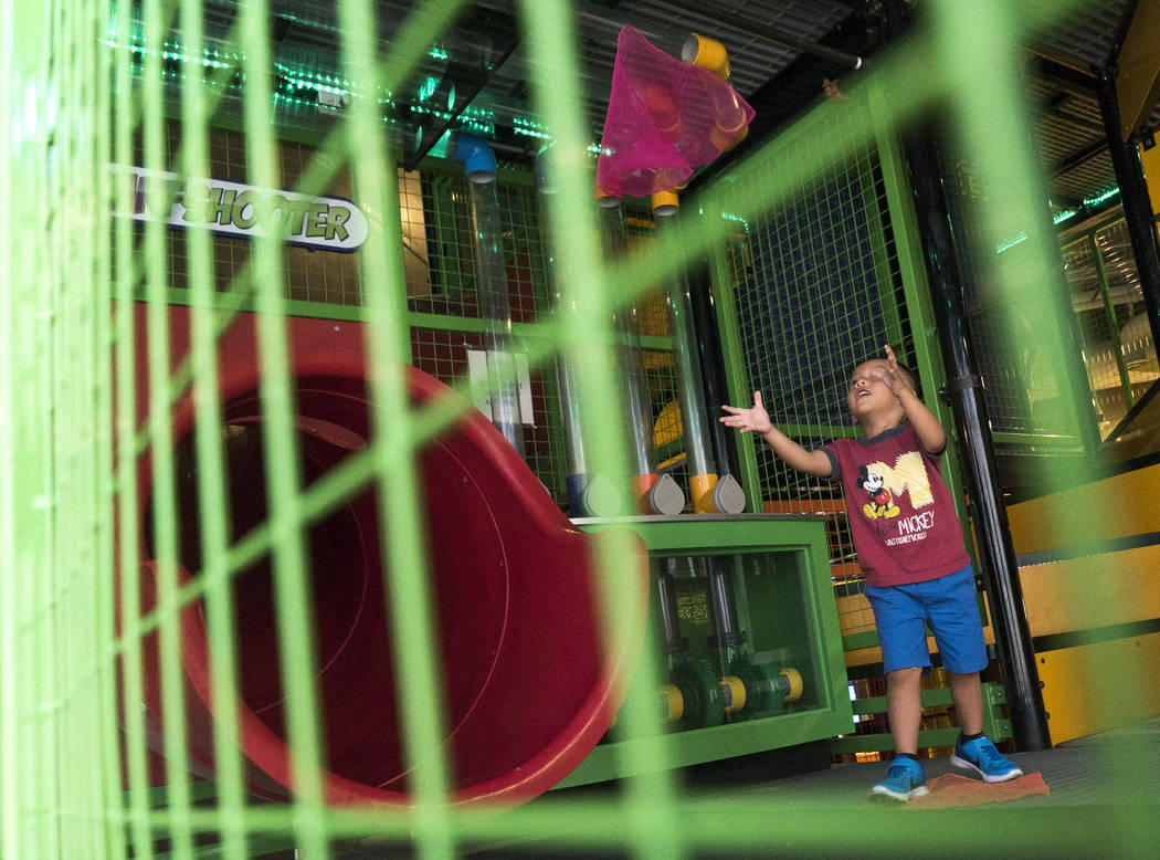 Jaden Duong, 3, plays with a wind machine inside of The Summit exhibit to celebrate the Discovery Children's Museum's birthday in Las Vegas, Sunday, Sept. 9, 2018. (Marcus Villagran/Las Vegas Revi ...