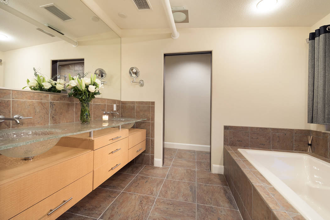 The C2 Lofts condo features a modern bath. (Christopher Homes)
