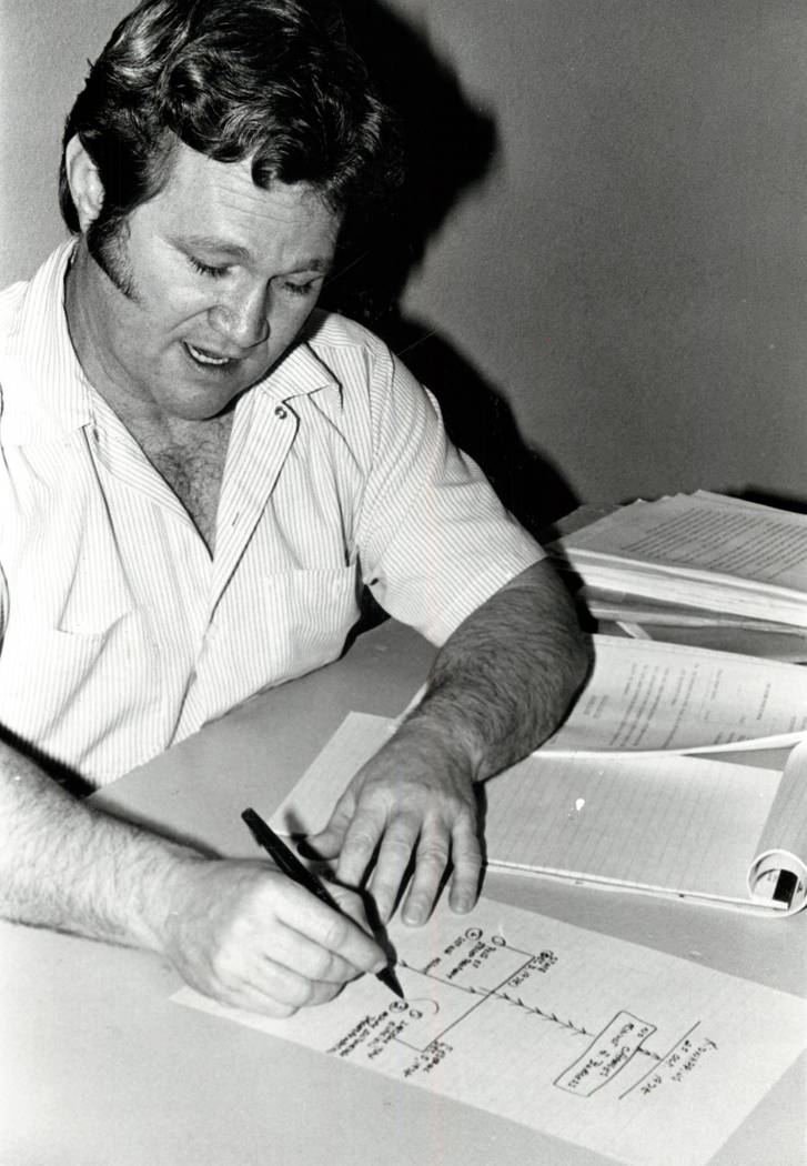 Jerald Burgess draws a diagram in 1982. (File Photo)