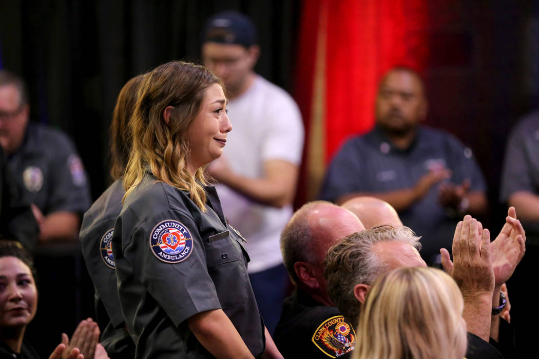 Kaitlyn Rogers and fellow members of Community Ambulance, "The 21," are honored for their courage under fire, exceptional care for patients and resilience in the wake of the Route 91 festival shoo ...